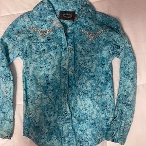 A child’s Button down long sleeve